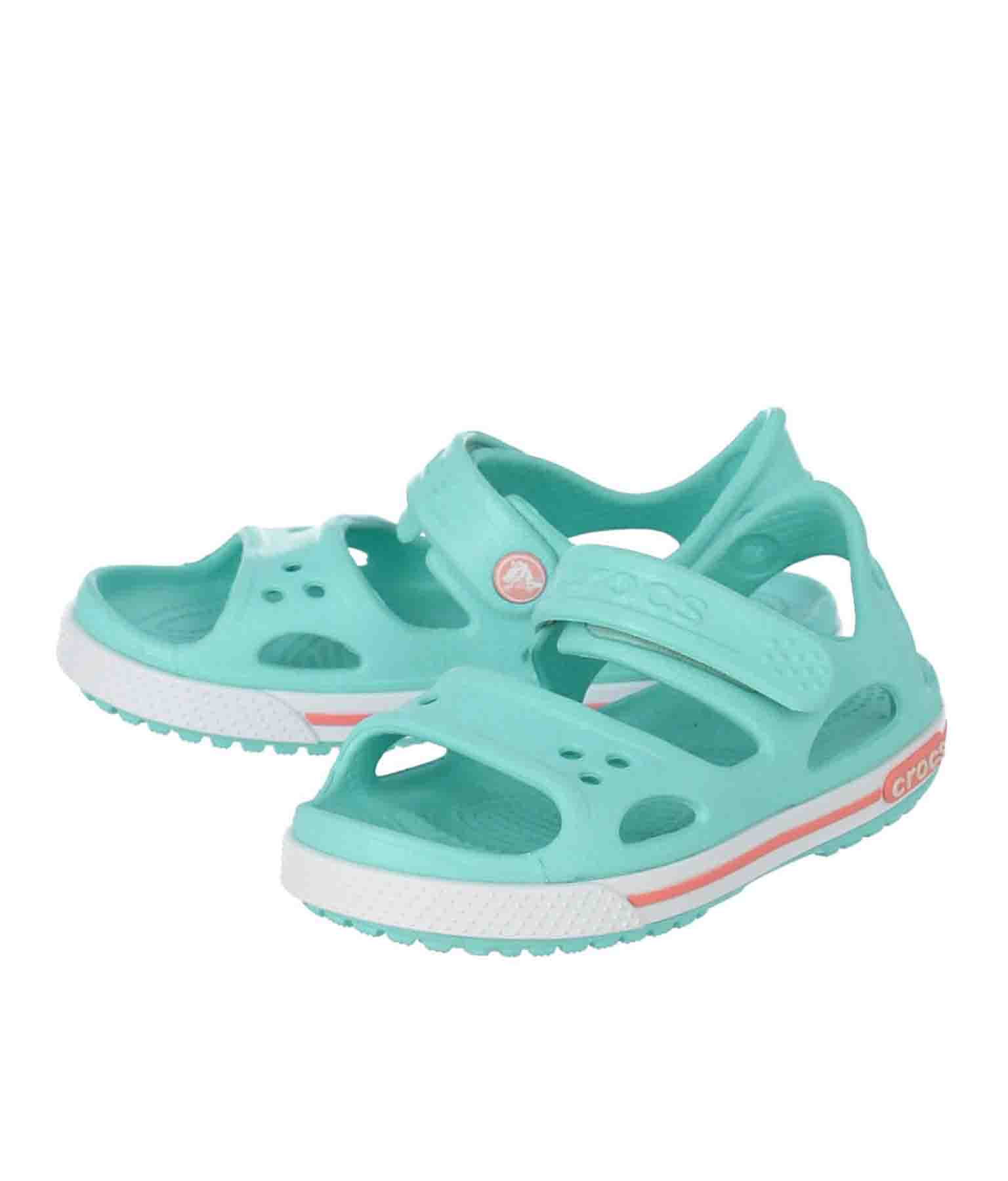 blue and green crocs
